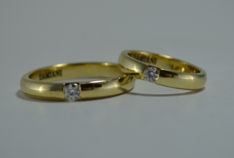 Свадебные кольца Damiani из желтого золота с бриллиантами на заказ 